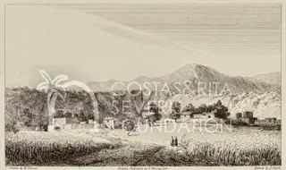 Distant village of flat-roofed houses and trees beneath hills, with two figures on a track through fields