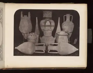 Terracotta vessels including jugs, amphorae and a tall flask