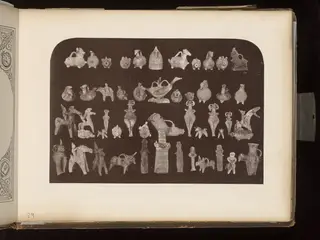 Rows of small pale clay vessels shaped like animals and riders, and standing figurines, on a dark background.