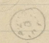 Circular object with small dots arranged around a central circle