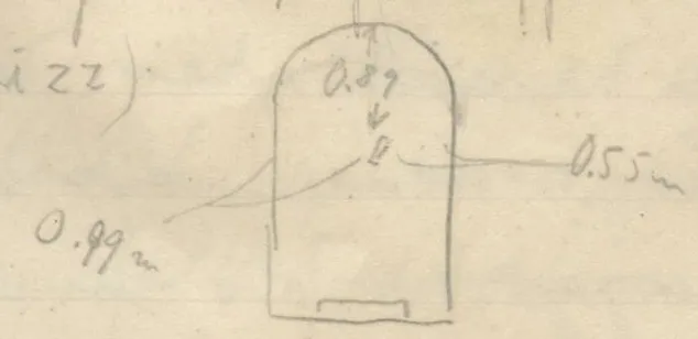 Arched stone with a small rectangular notch at the base and a spot in the upper middle