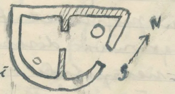 Plan of a building with straight and curved walls, hatched wall sections, an internal partition with a gap, two small circles inside, and a north arrow