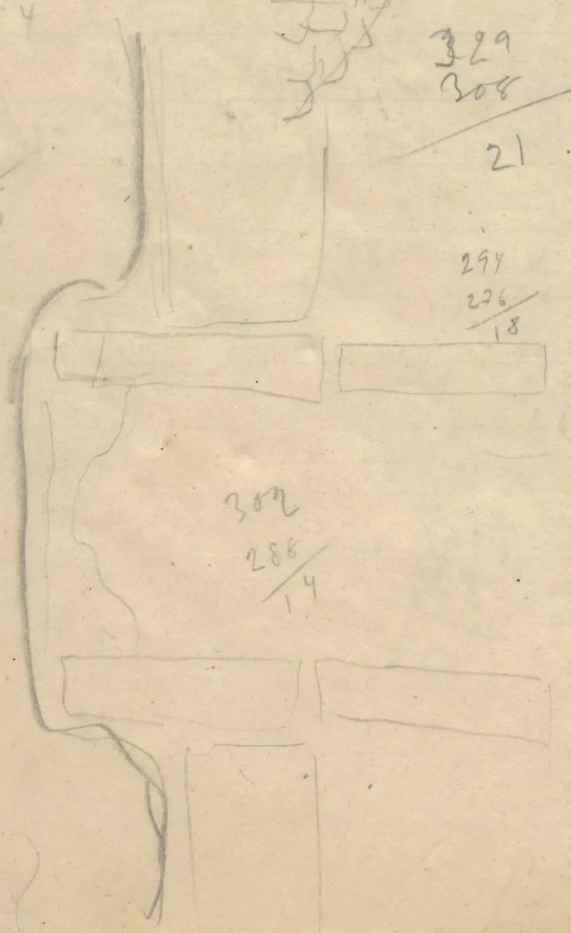 Architectural plan showing walls, stone blocks, steps, a triangular structure and a circular feature