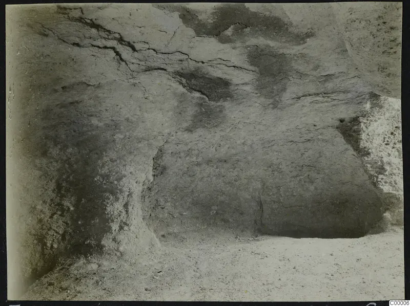 Tomb 302 at Vrysi tou Barba, Lapithos: interior of a rock-cut tomb chamber during excavation