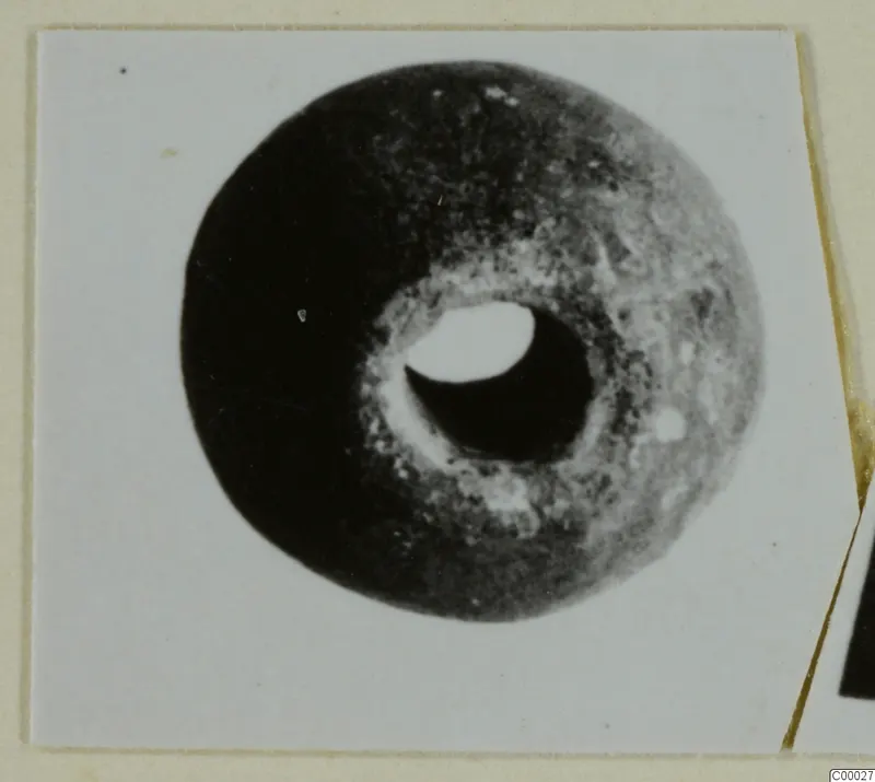 Disc-shaped piece of jewellery with a large central hole, from Lapithos, Vrysi tou Barba tombs