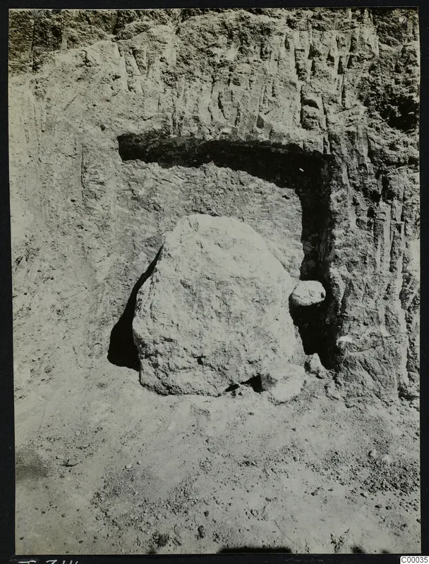 Tomb 314 at Lapithos, Vrysi Tou Barba, with a large stone lying in the chamber opening during excavation.