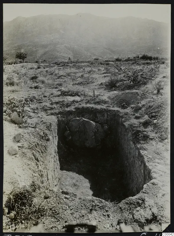 Tomb 305 at Lapithos, Vrysi tou Barba, during excavation, with a large boulder lying in the tomb chamber