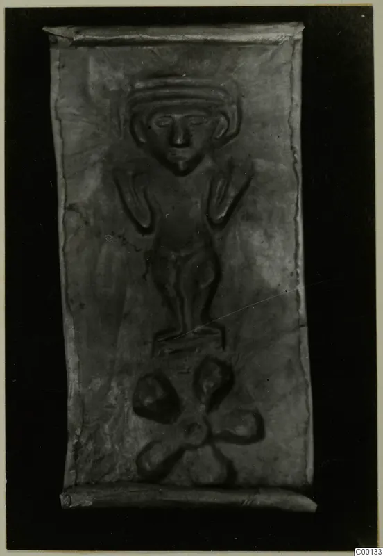 Rectangular metal plaque with an embossed standing figure and a lobed motif below, from Lapithos