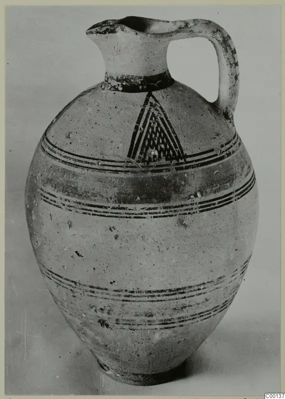 Bichrome I pottery jug from Lapithos, with dark painted bands and a hatched triangle on the shoulder