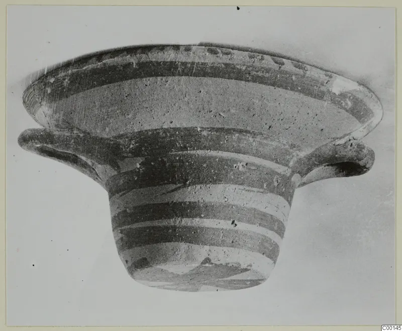 Pottery White Painted I bowl from Lapithos, with dark painted bands on a pale clay body
