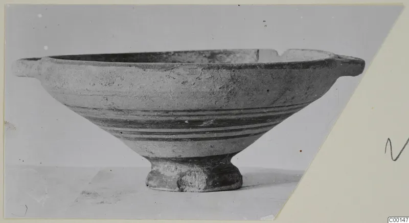 White Painted I bowl from the Kastros tombs at Lapithos, with two small horizontal handles and a ring foot