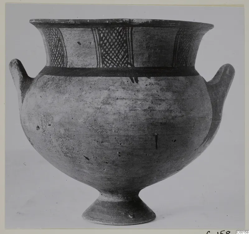 Pottery White Painted I bowl with cross-hatched bands on the neck, two small handles and a footed base.