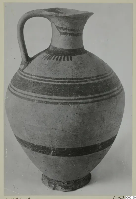White Painted I jug from the Kastros tombs at Lapithos, with a loop handle and dark painted bands