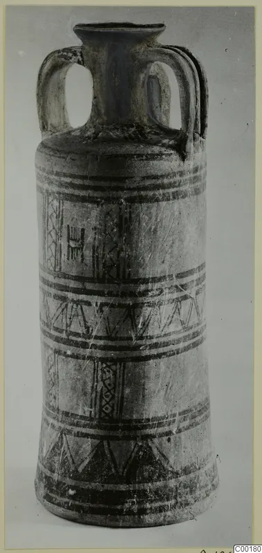 White Painted I amphora from Lapithos, with dark painted bands and geometric panels on a pale body