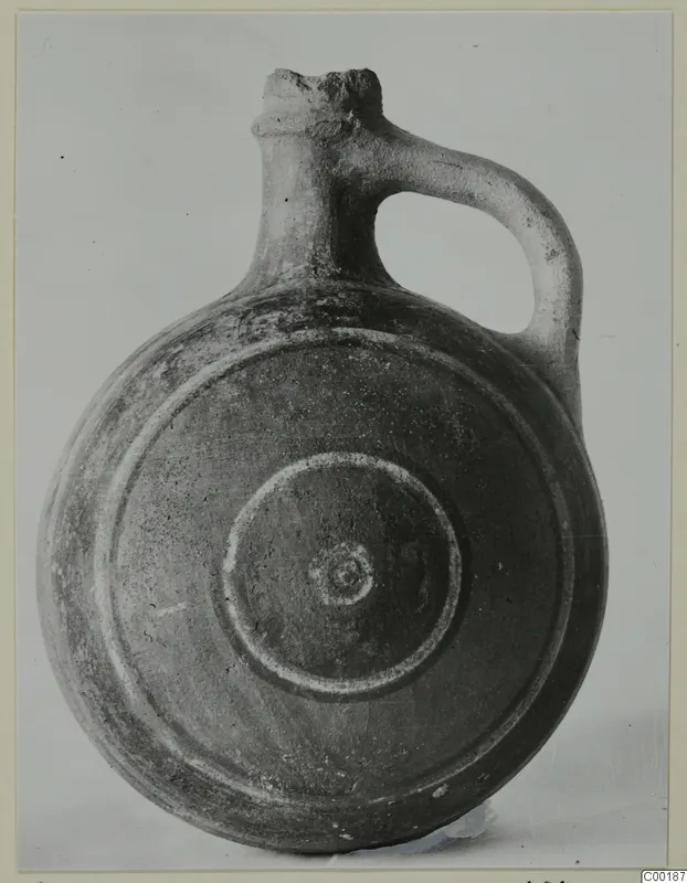 Round-bodied jug with a strap handle, Pottery Polychrome Lustrous Foreign, from the Kastros tombs at Lapithos