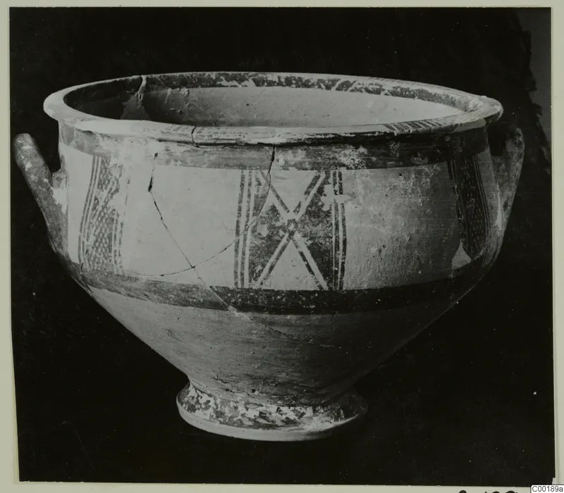 White Painted I bowl from Lapithos, with two small handles and dark painted bands and panels on a pale surface