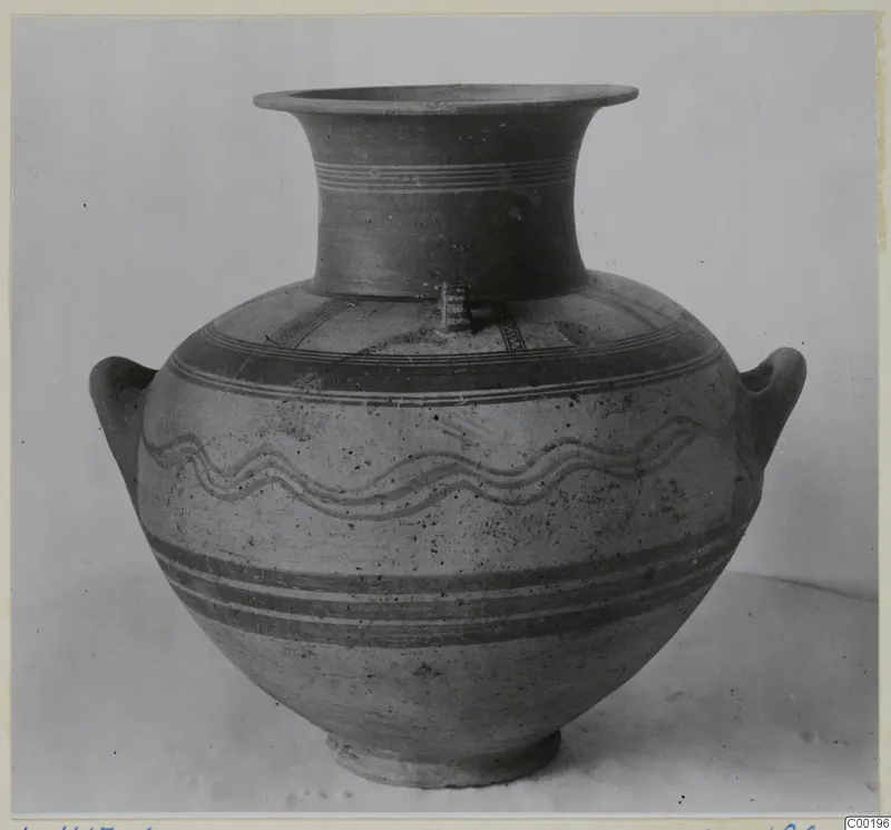 Two-handled White Painted I amphora from Lapithos with a flaring neck and painted bands and wavy lines