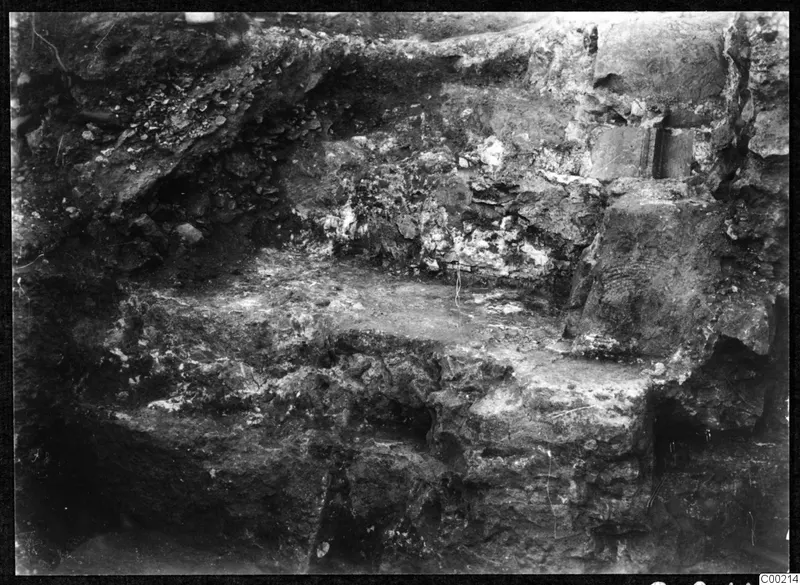Excavated stone steps and tiers at the theatre at Soli, with rubble and earth banks around them