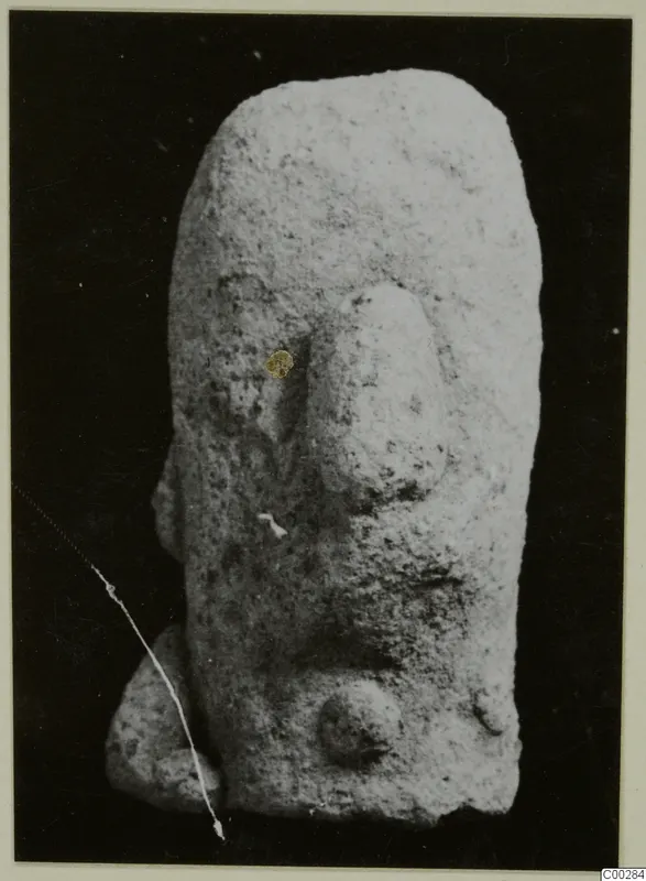 Terracotta Minor Plastic 3 from Soli: a rough, upright figurine with a broad lump projecting from the front like a nose.