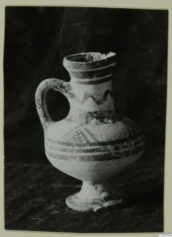 White Painted II jug from Lapithos, Kastros tombs, with painted bands, a zigzag and a checkered triangle