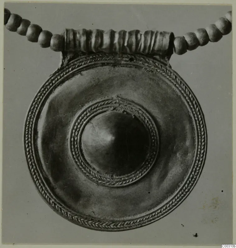 Round disc pendant with a domed centre and rope-twist border, hung from a ribbed loop on a beaded cord