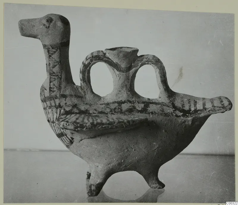 Bird-shaped pottery vessel with painted dark bands, from the Kastros tombs at Lapithos