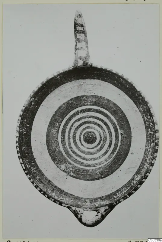 Pottery White Painted I bowl from Lapithos, seen from above, with concentric painted rings and a handle