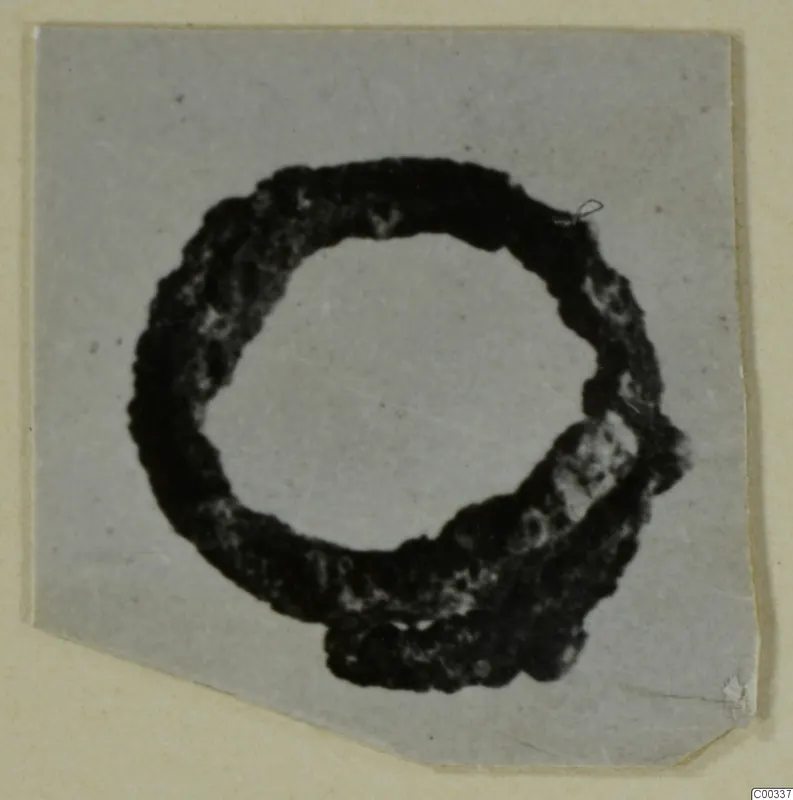 Corroded bronze ring, possibly an ear-ring, from Lapithos.