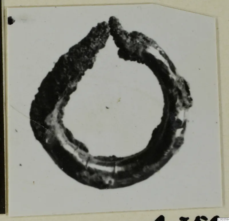 Corroded bronze ring-shaped adornment from Lapithos.