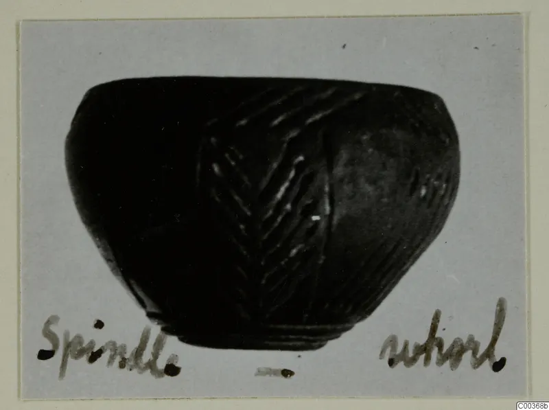 Black polished bowl with incised chevron bands, from Lapithos, on a grey card mount