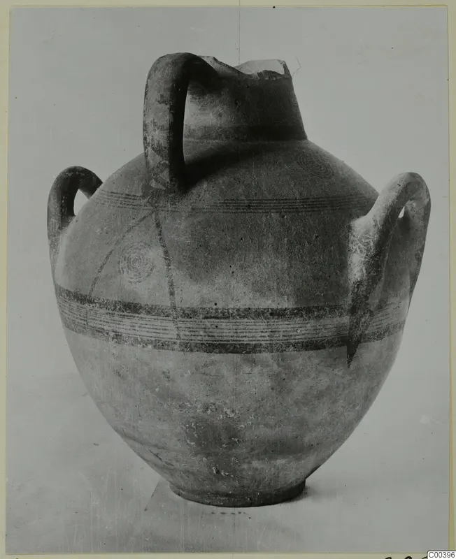 Painted pottery vessel with three handles and black bands, from the Kastros tombs at Lapithos