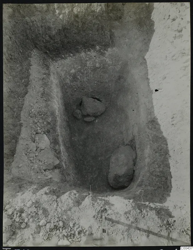 Tomb 312 at Lapithos, Vrysi tou Barba, during excavation, with large stones lying in the tomb chamber.