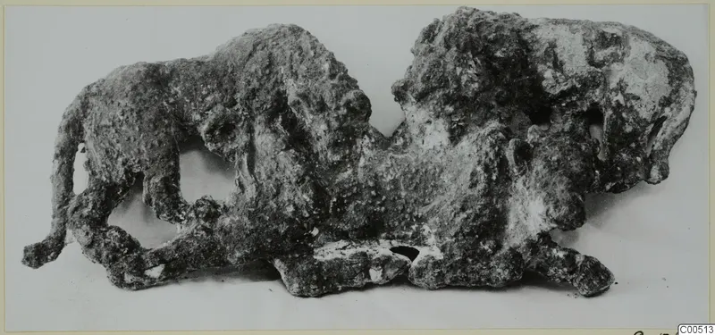 Corroded bronze relief of two animals, before restoration, from Vouni