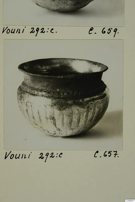 Silver vessel from Vouni with a flared rim and vertical lobed decoration on its body