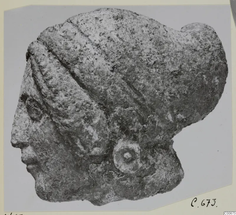 Limestone head fragment from Vouni, shown in profile facing left