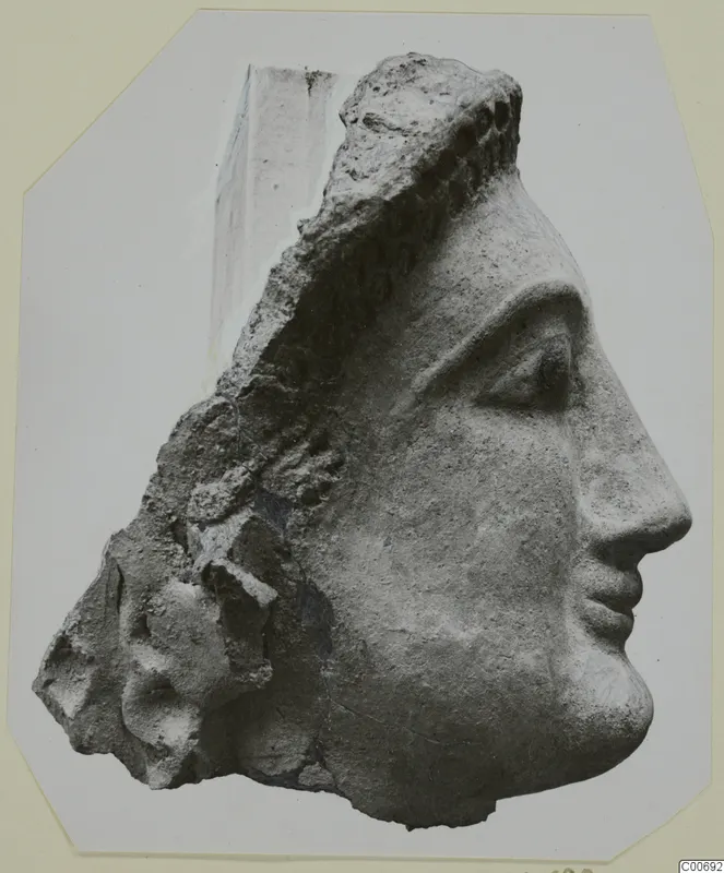 Terracotta head from Vouni, shown in profile facing right with a broken left side