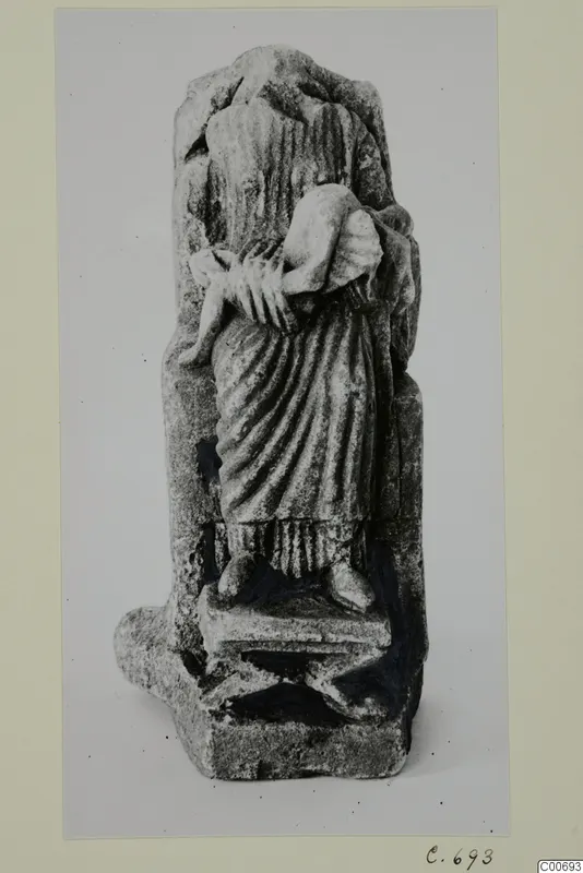 Limestone statuette of a seated figure holding a child on its lap, from Vouni