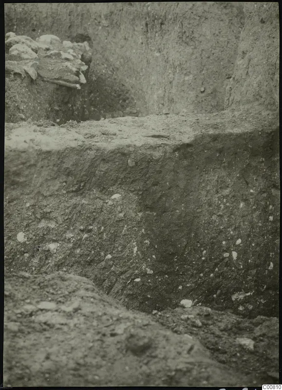 Excavation trench at Plakes, Lapithos, with stones embedded in the soil face