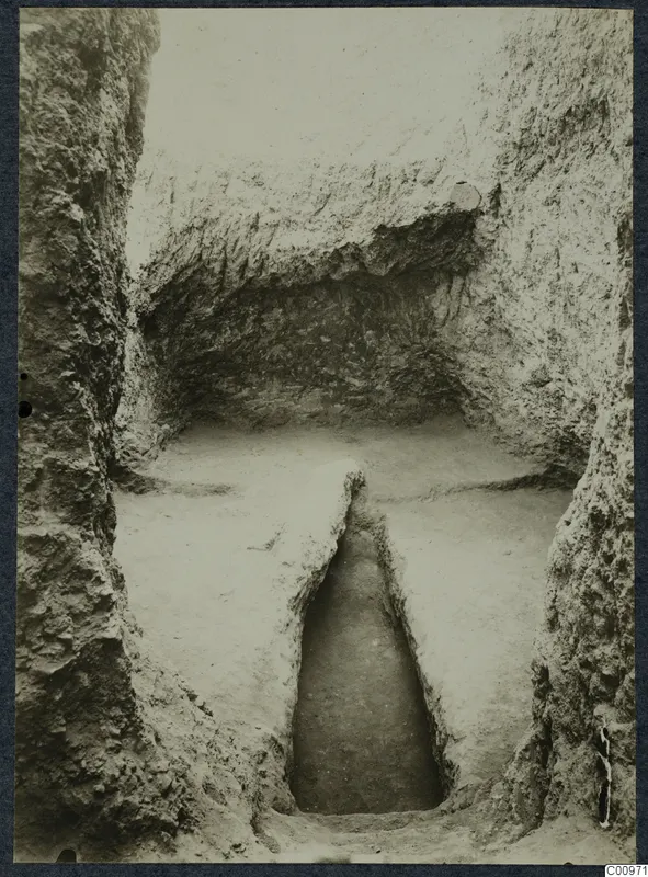 Excavation cutting at Idalion with a narrow sunken trench running down the floor between earth banks