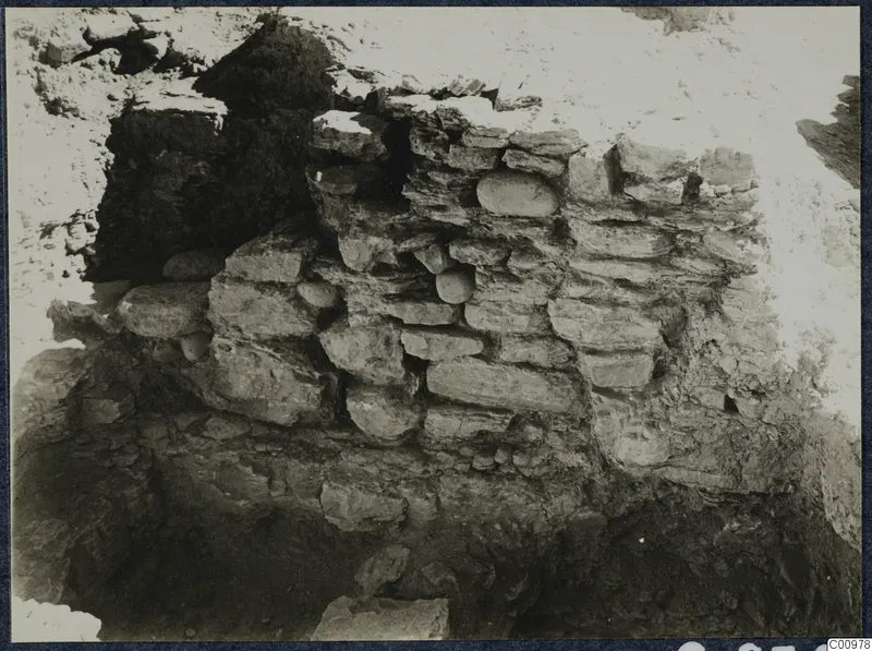 Stone wall with rounded stones and layered masonry in an excavation at Idalion acropolis