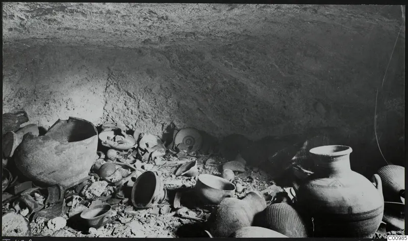 Tomb 428 at Lapithos Kastros, chamber interior with pottery vessels and sherds lying in situ