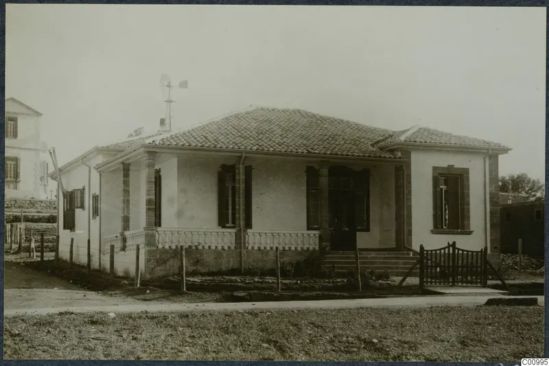 The Swedish house at Nicosia, a white single-storey house with a tiled roof and a veranda