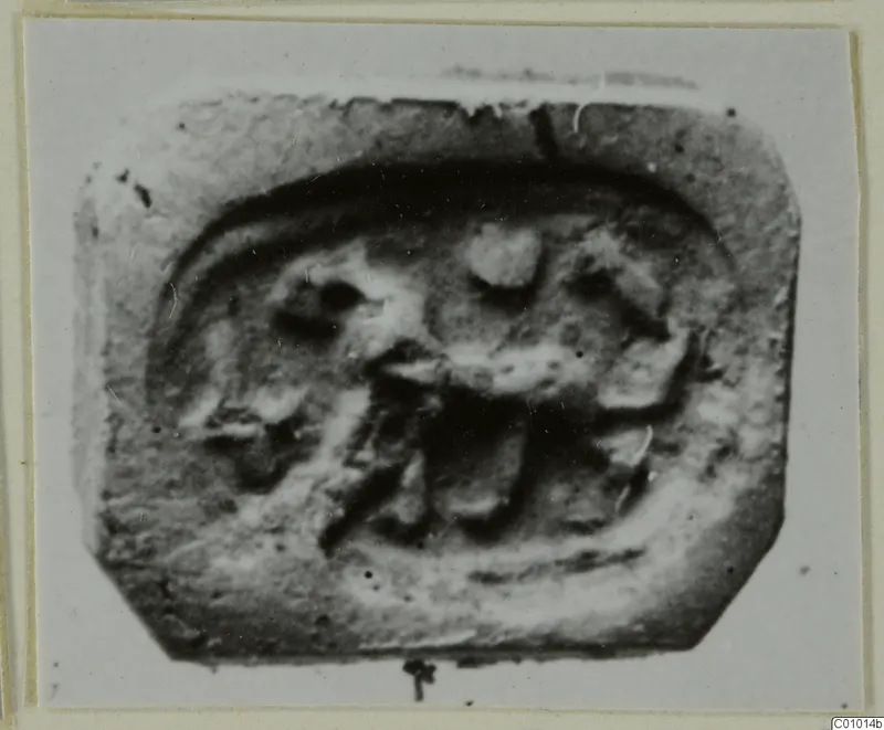 Seal impression with clipped corners, showing a low-relief figure with legs inside a raised border