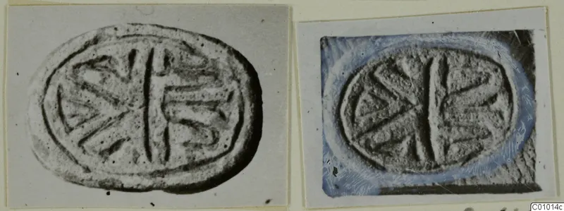 Two photographs of an oval stone seal impression with an incised design of a central bar and radiating strokes
