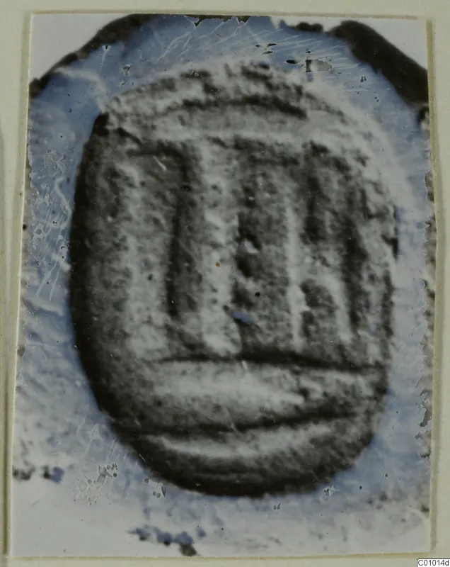 Seal impression, an oval impression with a design of vertical and horizontal lines.