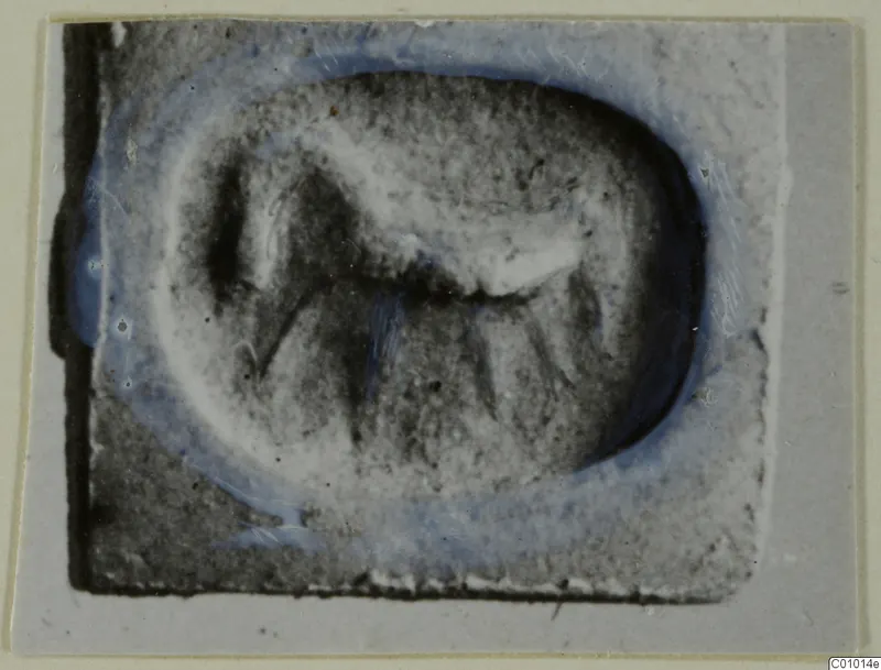 Seal impression, glyptic find from Idalion, with a raised figure inside an oval field