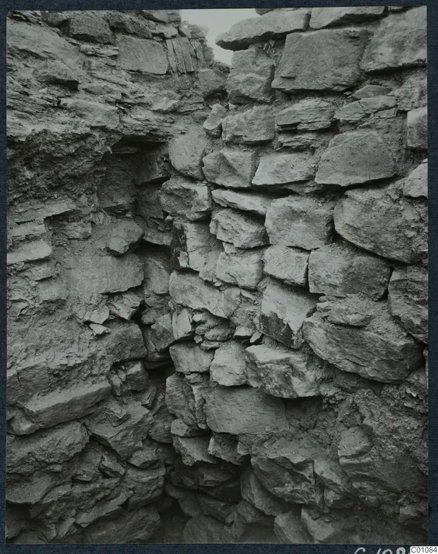 Stone wall with irregular blocks and a narrow gap at the Idalion Acropolis excavation.