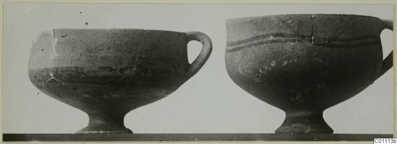 Two footed bowls side by side, the right one with two painted bands below the rim