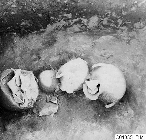 Pottery vessels lying in situ in the interior of Marion T. 93