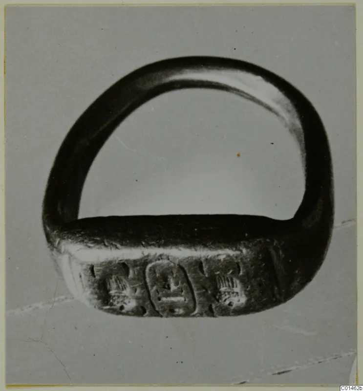 Ring with an engraved bezel bearing incised signs, from Ayios Iakovos